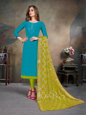 Celebrate This Festive Season With This Pretty suit In Blue Colored Top Paired With Parrot Green Colored Bottom and Dupatta. Its Top Is Fabricated On Modal Silk Paired With Cotton Bottom and Chiffon Jacquard Dupatta. Buy This Dress Material Now.