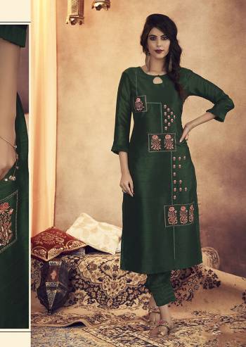 You Will Definitely Earn Lots Of Compliments Wearing This Designer Readymade Pair Of Kurti And Pant In Dark Green Color. This Lovely Embroidered Pair Is Fabricated On Soft Art Silk And Available In All Regular Sizes. Buy Now.