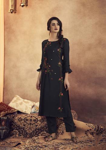 Add This Very Pretty Pair Of Kurti And Pant In Black Color. This Kurti and Pant Are Fabricated On Soft Art Silk Which Also Gives A Rich Look To Your Personality. Also It Is Beautified With Pretty Minimal Embroidery. 