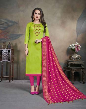 Shine Bright In This Lovely Designer Straight Suit In Parrot Green colored Top Paired With Contrasting Rani Pink Colored Bottom and Dupatta. Its Top Is Fabricated On Soft Cotton Paired With Cotton Bottom and Banarasi Jacquard Dupatta. Buy This Dress Material Now.