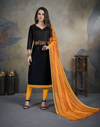 Grab This Designer Straight Suit In Black Colored Top Paired With Yellow Colored Bottom And Dupatta. Its Top Is Fabricated On Modal Silk Paired With Cotton Bottom And Banarasi Dupatta. Buy This Dress Material Now.