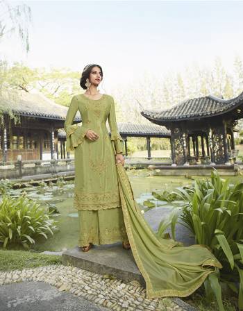 Get Ready For The Upcoming Wedding And Festive Season With This Beautified Designer Straight Suit In Light Green Color. Its Top Is Chinon Based Paired With Georgette Bottom and Dupatta. Its Fabrics Are Light Weight And Easy To Carry Throughout The Gala. 