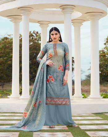 Here Is A Very Pretty Designer Straight Suit In Grey Color. Its Top Is Fabricate On Cotton Silk Paired With Cotton Bottom And Soft Cotton Dupatta. This Pretty Suit Is Beautified With Digital Print And Tone To Tone Thread Work. It Is Light In Weight And Easy To Carry All Day Long. 