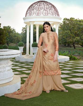 Flaunt Your Rich And Elegant Taste In This Lovely Designer Straight suit In Beige color. Its Top Is Cotton Silk Based Paired With Cotton Bottom And Soft Cotton Dupatta. It Has Elegant Tone To Tone Thread Work With Digital Print.