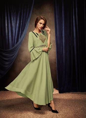 Flaunt Your Rich And Elegant Taste Wearing This Designer Readymade Long Gown In Light Green Color. This  Pretty Gown Is Fabricated On Rayon Beautified With Thread Work. Its Fabric Is Soft Towards Skin And Easy To Carry All Day Long. 