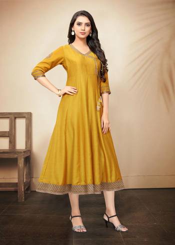 Celebrate This Festive Season With Beauty And Comfort Wearing This Designer Readymade Kurti In Yellow Color. It Is Fabricated On Soft Silk Beautified With Detailed Embroidery. It Can Be Paired With Same Or Contrasting Colored Leggings Or Pants. 