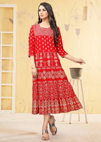 Grab This Pretty Red Colored Kurti Fabricated On Rayon. This Readymade Kurti Is Beautified With Prints and Also it is Available  In all Regular Sizes. 