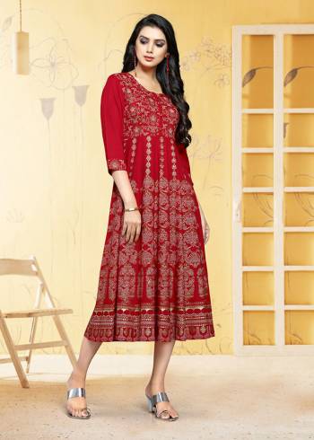 Grab This Pretty Red Colored Kurti Fabricated On Rayon. This Readymade Kurti Is Beautified With Prints and Also it is Available  In all Regular Sizes. 