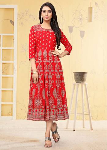 Grab This Pretty Red Colored Kurti Fabricated On Rayon. This Readymade Kurti Is Beautified With Prints and Also it is Available  In all Regular Sizes. 