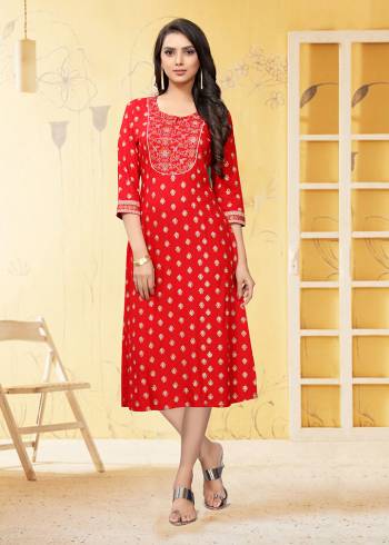 Grab This Pretty Red Colored Kurti Fabricated On Rayon. This Readymade Kurti Is Beautified With Prints and Also it is Available  In all Regular Sizes. 