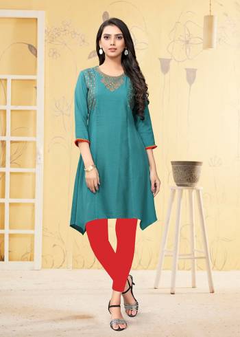 Grab This Readymade Kurti In Blue Color Fabricated On Rayon Flex. It Is Light In Weight And Easy To Carry All Day Long. 