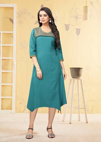 Here Is A Very Pretty Readymade Kurti In Blue Color Fabricated On Rayon Flex. It Is Beautified With Thread Work And Available In All Regular Sizes. 