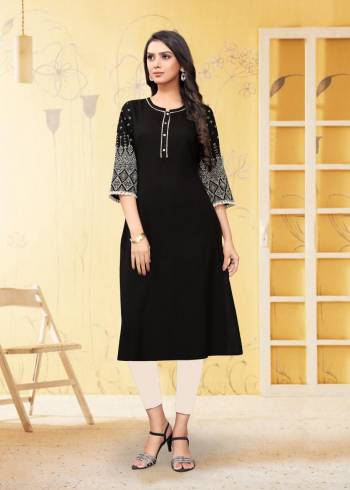 For Your Semi-Casual Wear, Grab This Readymade Kurti In Black Color Fabricated On Rayon Flex. It Is Beautified With DetailedThread Work. You Can Pair This Up With Same Or Contrasting Colored Bottom. Buy Now.