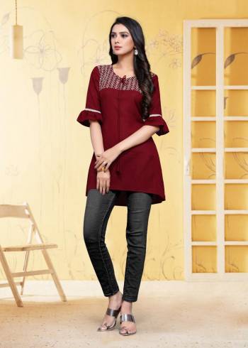 For Your Semi-Casual Wear, Grab This Readymade Kurti In Maroon Color Fabricated On Rayon Flex. It Is Beautified With DetailedThread Work. You Can Pair This Up With Same Or Contrasting Colored Bottom. Buy Now.