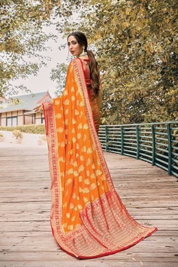 Flaunt Your Rich And Elegant Taste Wearing This Silk Based Saree In Musturd Yellow Color Paired With Red Colored Blouse, This Pretty Weaved Saree And Blouse Are Fabricated On Nylon Silk Which Gives A Rich Look To Your Personality.
