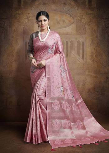 Celebrate This Festive Season In This Very Beautiful And Attractive Looking Designer Saree In Pink Color Paired With Contrasting Mauve Colored Blouse. This Saree and Blouse Are Fabricated On Jacquard Silk Beautified With Weave All Over. Buy This Saree Now.