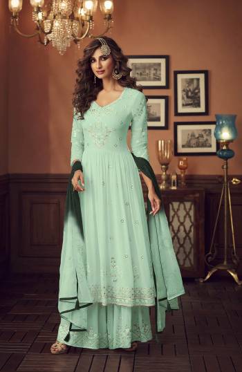 Grab This Very Pretty Designer Pakistani Sharar Suit In Pastel Green Color. Its Embroidered Top And Bottom Are Fabricated On Georgette Paired With Chiffon Fabricated Dupatta. All Its Fabric Are Light Weight And Easy To Carry Throughout The Gala. 