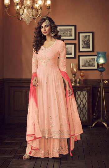 Grab This Very Pretty Designer Pakistani Sharar Suit In Peach Color. Its Embroidered Top And Bottom Are Fabricated On Georgette Paired With Chiffon Fabricated Dupatta. All Its Fabric Are Light Weight And Easy To Carry Throughout The Gala. 