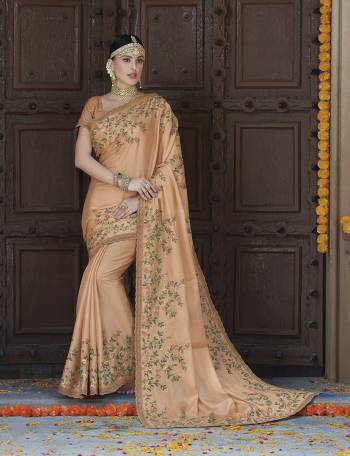 Celebrate This Festive Season Wearing This Designer Saree In Light Peach Color Paired With Light Peach Colored Blouse. This Saree Is Fabricated On Tussar Art Silk Paired With Crepe Silk Fabricated Blouse. 