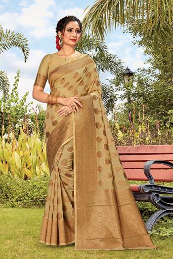 For A Proper Traditional Look, Grab This Designer Weaved Saree In Beige Color. This Saree And Blouse Are Fabricated On Cotton Handloom Beautified With Weave. Its Fabric Is Durable And Easy To Carry. 