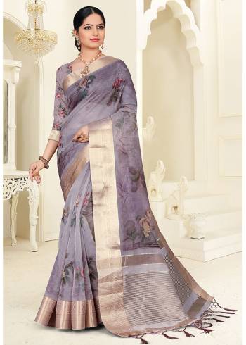 Add This Lovely Saree To Your Wardrobe In Mauve Color, This Pretty  Saree Is Orgenza Based Beautified With Pretty Floral Prints. 