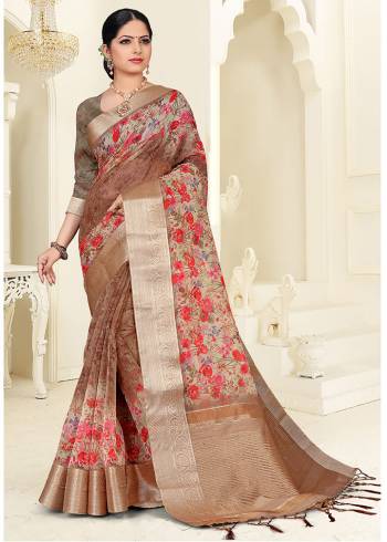 Celebrate This Festive Season With Beauty And Comfort Wearing This Printed Saree In Brown And Multi color. This Saree Is Fabricated On Orgenza Which Is Light Weight And Easy To Carry Throughout The Gala.