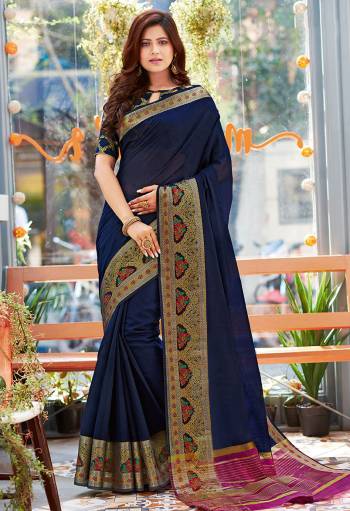 Celebrate This Festive Season Wearing This Pretty Saree In Navy Blue Color. This Saree And Blouse Are Fabricated On Khadi Silk Beautified With Weaved Border.