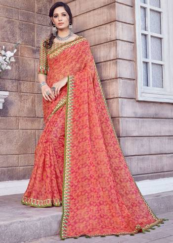 Grab This Beautiful Designer Saree In Red & Orange Color. This Pretty Printed Saree Is Cotton Silk Based Paired With Art Silk Fabricated Blouse. Buy Now.