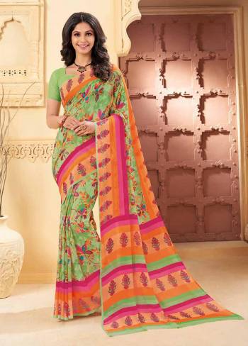 For Your Casual Wear Grab This Pretty Printed Saree, This Saree And Blouse Are Fabricated On Georgette Beautified With Prints. Buy This Saree Now.