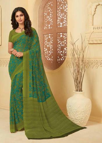 Here Is A Pretty Saree For Your Casual Or Semi-Casual Wear. This Printed Saree And Blouse Are Fabricated On Georgette WhichIs Light Weight, Durable And Easy To Carry All Day Long. Buy Now.