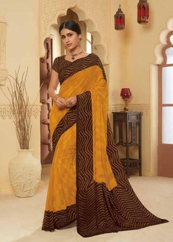 Add This Lovely Saree To Your Wardrobe Fabricated On Georgette. It Is Beautified With Prints All Over Gives A Pretty Simple and Elegant Look To Your Personality. 