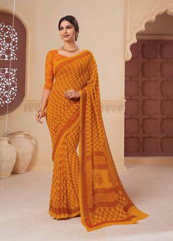 Add This Lovely Saree To Your Wardrobe Fabricated On Georgette. It Is Beautified With Prints All Over Gives A Pretty Simple and Elegant Look To Your Personality. 