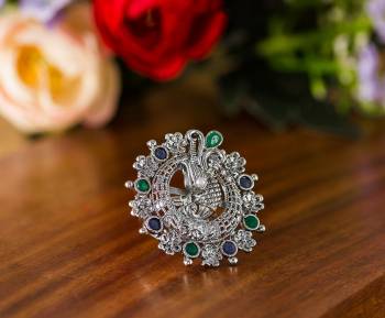 Here Is A Pretty Traditional Looking Ring In Silver Color In Oxidize Material. This Pretty Ring Is Beautified With Multi Color Stone Work And You Can Pair This Up With Any Colored Traditional Attire. Buy Now.