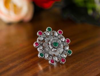 Here Is A Pretty Traditional Looking Ring In Silver Color In Oxidize Material. This Pretty Ring Is Beautified With Multi Color Stone Work And You Can Pair This Up With Any Colored Traditional Attire. Buy Now.