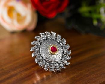 Here Is A Pretty Traditional Looking Ring In Silver Color In Oxidize Material. This Pretty Ring Is Beautified With Multi Color Stone Work And You Can Pair This Up With Any Colored Traditional Attire. Buy Now.