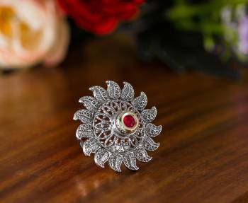 Here Is A Pretty Traditional Looking Ring In Silver Color In Oxidize Material. This Pretty Ring Is Beautified With Multi Color Stone Work And You Can Pair This Up With Any Colored Traditional Attire. Buy Now.