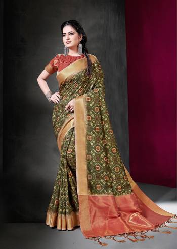 Here Is A Rich And Elegant Looking Silk Based Designer Saree For Festive Or Semi-Casual Wear. This Beautiful Saree And Blouse Are Fabricated On Art Silk Beautified With Prints. Buy Now.