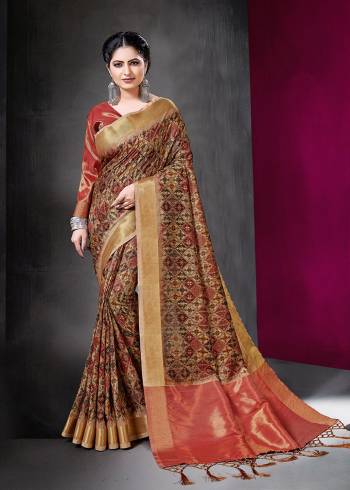 Here Is A Rich And Elegant Looking Silk Based Designer Saree For Festive Or Semi-Casual Wear. This Beautiful Saree And Blouse Are Fabricated On Art Silk Beautified With Prints. Buy Now.