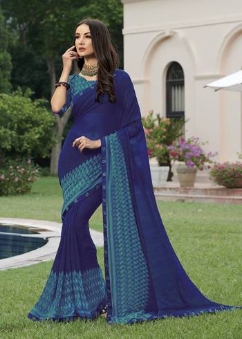 Here Is A Pretty Saree For Your Casual Or Semi-Casual Wear. This Printed Saree Is Fabricated On Georgette WhichIs Light Weight, Durable And Easy To Carry All Day Long. Buy Now.