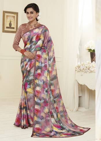 Add This Lovely Multi Colored Saree To Wardobe. This Beautiful And Attractive Looking Saree IS Beautified With Prints Which Is Suitable For Casual Or Semi-Casuals. 