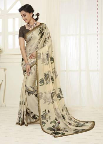 Grab This Pretty Printed Designer Saree For Your Casual Or Semi-Casual Wear In Cream Color. This Saree Is Light Weight, Soft Towards Skin and Easy To Carry All Day Long. 