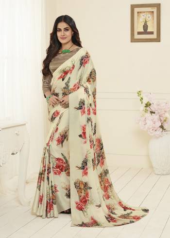 Add This Lovely Cream Colored Saree To Wardobe. This Beautiful And Attractive Looking Saree IS Beautified With Prints Which Is Suitable For Casual Or Semi-Casuals. 