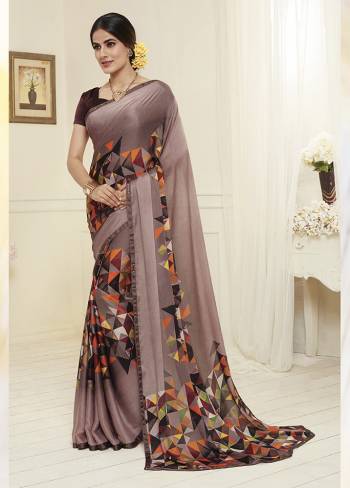 Add This Lovely Mauve Colored Saree To Wardobe. This Beautiful And Attractive Looking Saree IS Beautified With Prints Which Is Suitable For Casual Or Semi-Casuals. 