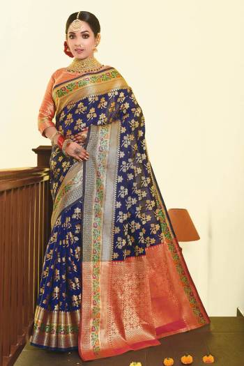 Enhance Your Personality Wearing This Pretty Designer Saree In Navy Blue Color Paired With Contrasting Dark Pink Colored Blouse. This Saree And Blouse Are Fabricated On Art Silk Beautified With Weave. Buy Now.