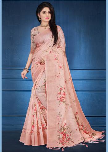 Look Pretty Wearing This Peach Colored Saree. This Saree And Blouse Are Fabricated On Linen Beautified With Floral Prints. It Is Light In Weight and Easy To Carry All Day Long. 