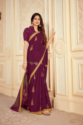 Simple and Elegant Looking Saree Is Here In Wine Color Paired With Contrasting Yellow Colored Blouse. This Saree And Blouse Are Fabricated On Satin Silk Beautified With Prints. It Is Light Weight , Soft Towards Skin and Easy To Carry All Day long. 