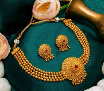 Give An Enhanced Look To Your Personality By Pairing Up This Beautiful Necklace Set With Your Ethnic Attire. This Pretty Set Is In Golden Color Beautified With Stone Work. Buy Now.