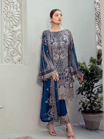 Grab This Attractive Looking Heavy Designer Straight Suit In Blue Color. Its Embroidered Top And Dupatta Are Georgette Based Paired With Santoon Bottom. Buy This Pretty Suit Now.