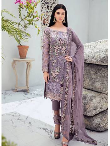Grab This Attractive Looking Heavy Designer Straight Suit In Mauve Color. Its Embroidered Top And Dupatta Are Georgette Based Paired With Santoon Bottom. Buy This Pretty Suit Now.