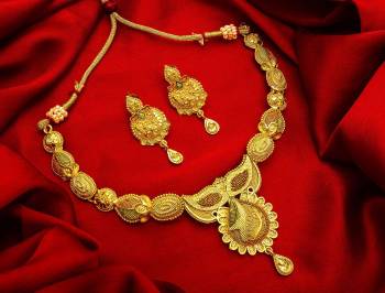 Give An Enhanced Look To Your Personality By Pairing Up This Beautiful Necklace Set With Your Ethnic Attire. This Pretty Set Is In Golden Color Beautified With Stone Work. Buy Now.